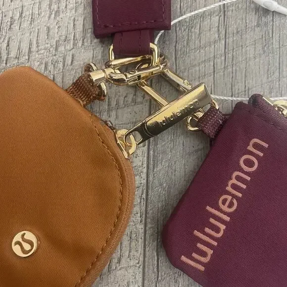 Lululemon Dual Pouch Wristlet Wallet Keychain Maroon Gold Tan Wordmark Strap